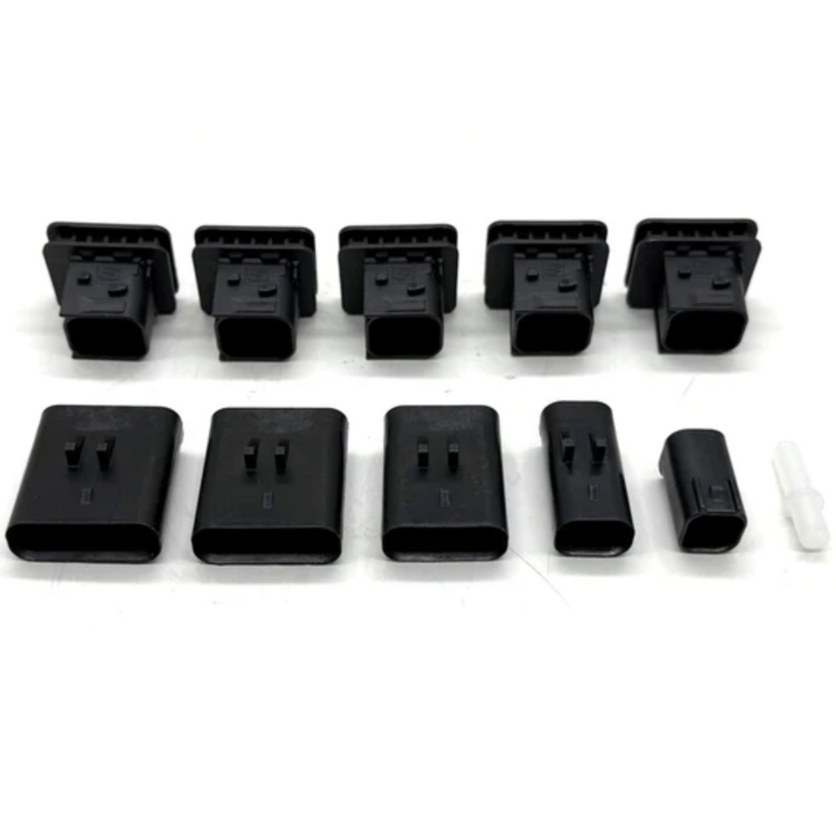 2016–2019 Titan XD 5.0 Cummins Harness Plug Kit: nissan Titan harness plug kit with black connector plugs in two rows