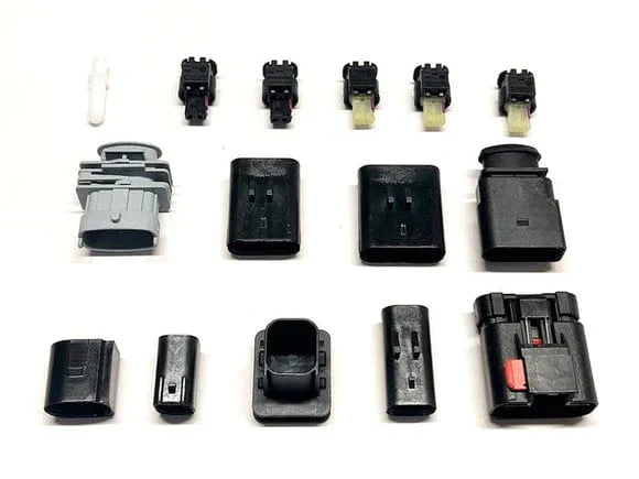 Assorted harness plug connectors and caps for Ram cab and chassis